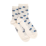 Chaussette femme mi-haute blanche à rayures beige et une rayure rose, vue latérale.