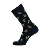 Chaussette homme mi-haute bleu marine motif mimosa jaune.